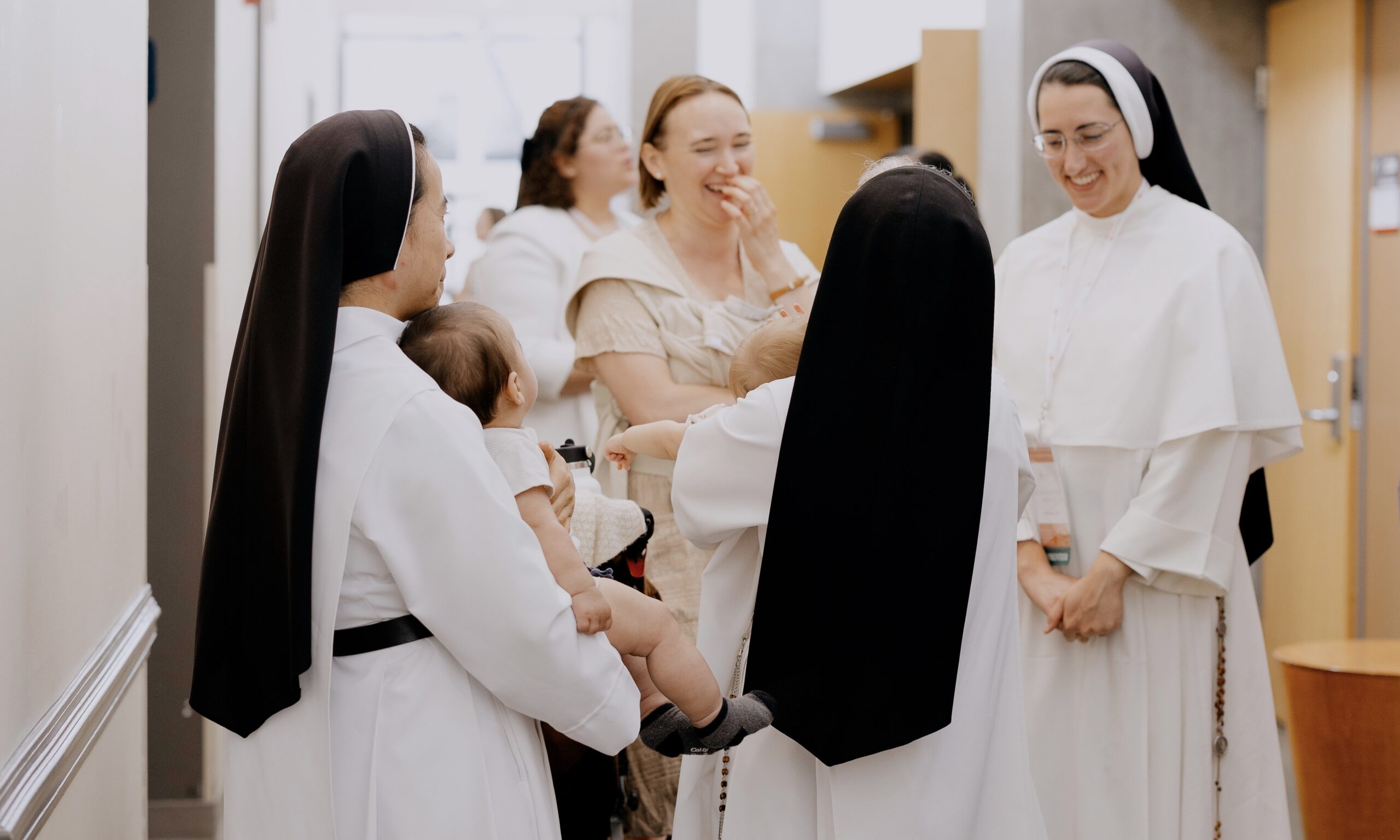Young mother with religious sisters at 2024 GIVEN Forum